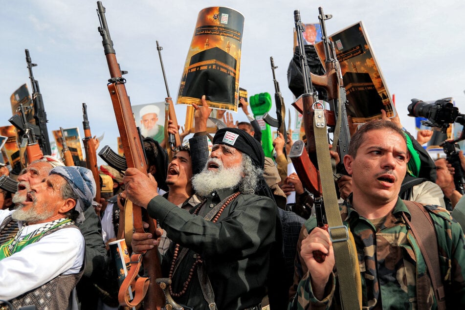 Houthi supporters gather for a mass rally denouncing comments made by President Donald Trump about Mecca. Saudi Arabia has now accused the rebel group of attacking the holy city.