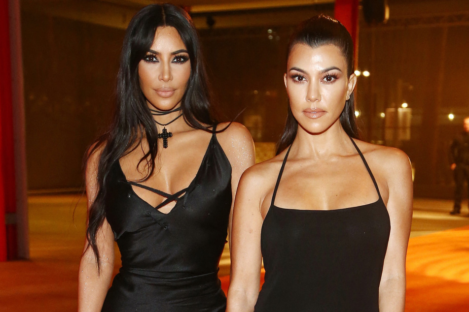 Kim Kardashian (l.) and Kourtney Kardashian (r.) oozed high fashion in their new SKIMS x Dolce & Gabbana collaboration.