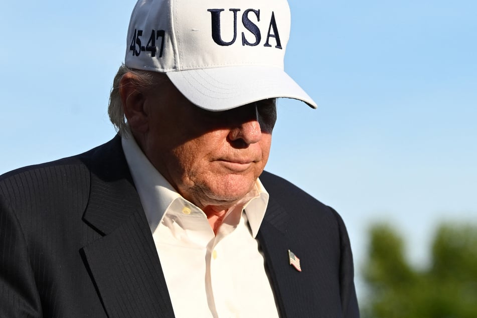 US President Donald Trump walks on the South Lawn of the White House in Washington, DC, on May 15, 2026.