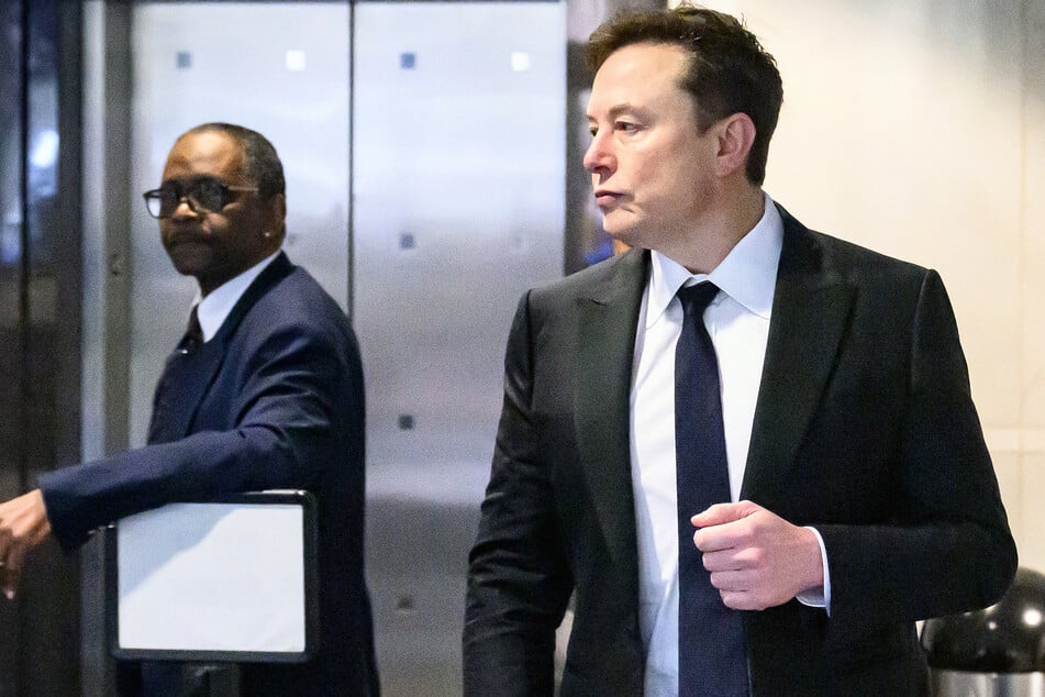 Elon Musk arrives at the federal courthouse during proceedings in the trial over his lawsuit against OpenAI in Oakland, California, on April 30, 2026.