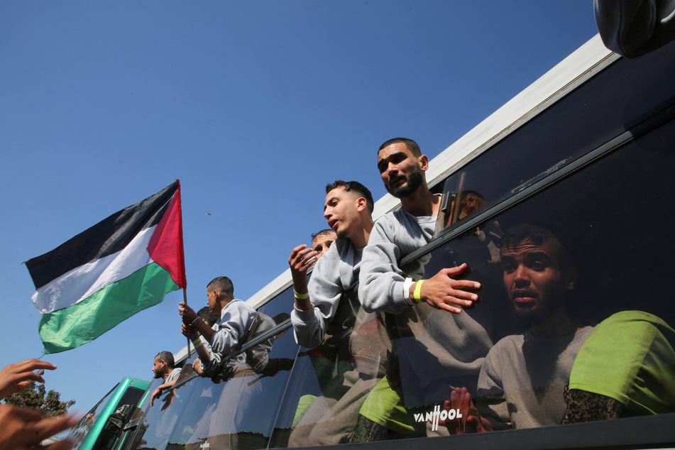 Three buses of Palestinians arrive in Gaza's Khan Younis after being freed from Israeli prisons