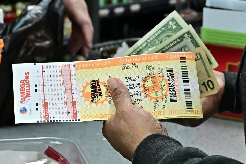 Lottery tickets for the Mega Millions lottery are purchased from a liquor store where winning tickets have been sold on December 27, 2024, in Hawthorne, California.