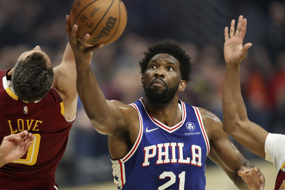 Joel Embiid led the Sixers to a win after the Cavs had threatened a comeback in the third quarter.