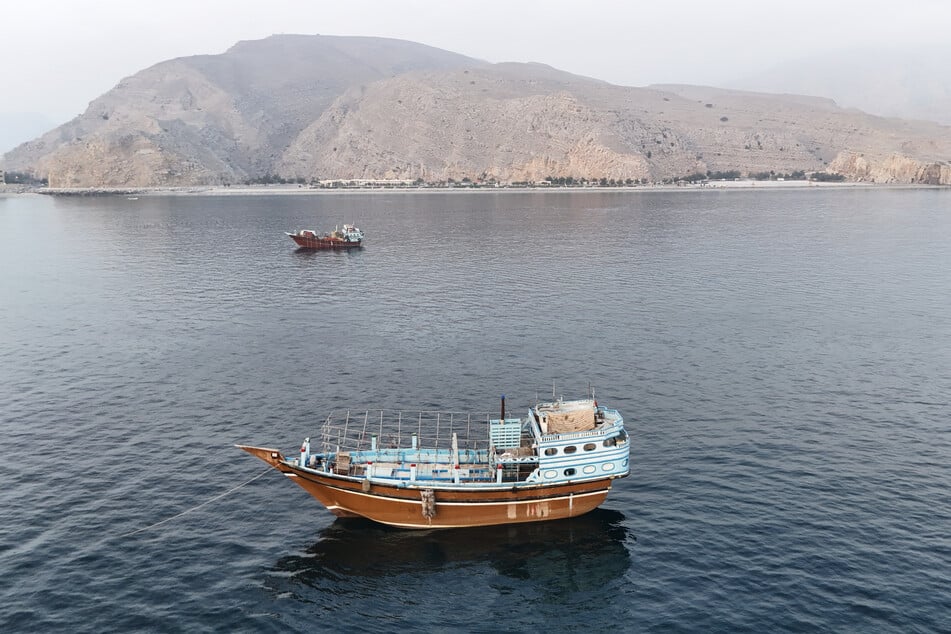 This aerial photograph shows boats anchored off Oman’s northern Musandam Peninsula near the Strait of Hormuz on Saturday.