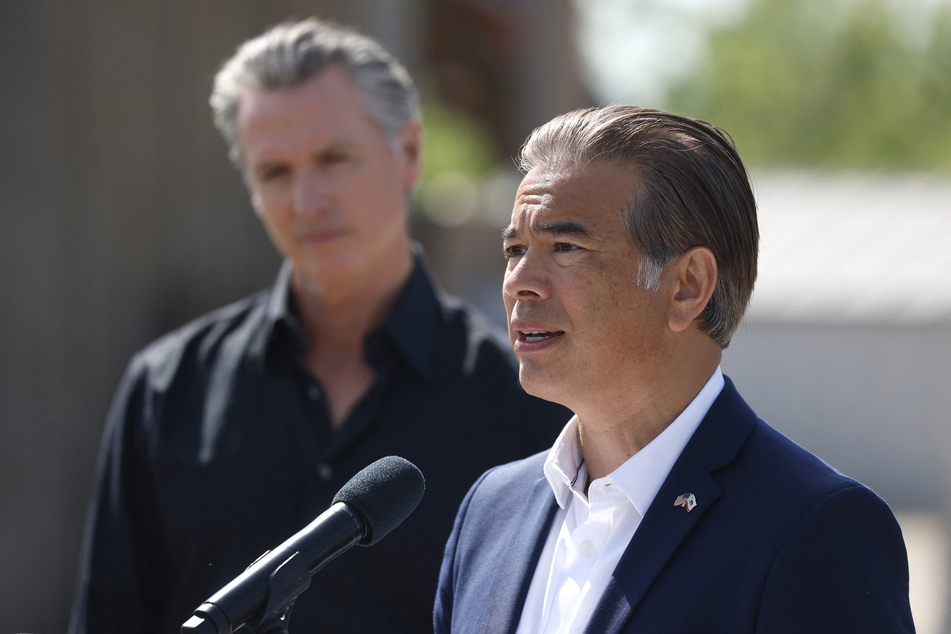 California Attorney General Rob Bonta (r.) has announced a lawsuit challenging the Trump administration's bid to scrap the state's tailpipe emission rules.