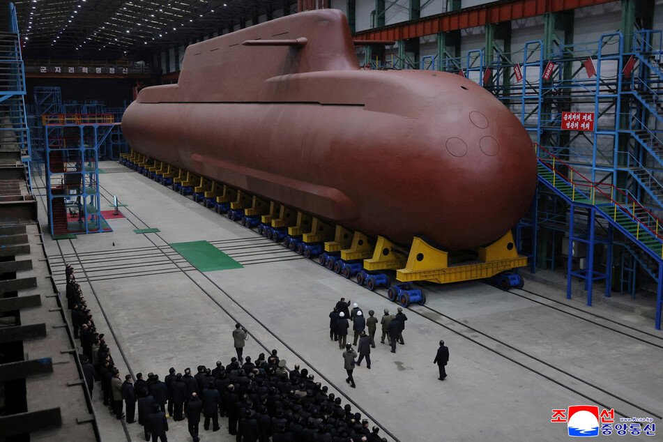 Kim Jong-un inspects massive North Korean nuclear sub as Vladimir Putin sends message