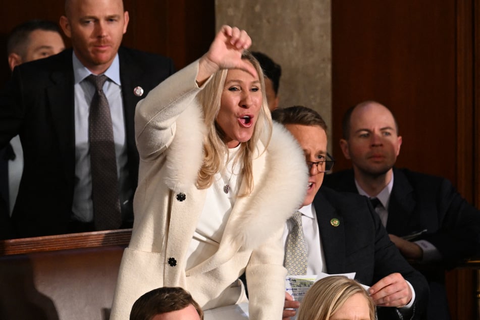 Marjorie Taylor Greene making a scene as President Joe Biden delivered the State of the Union address at the US Capitol in Washington DC, February 7, 2023.