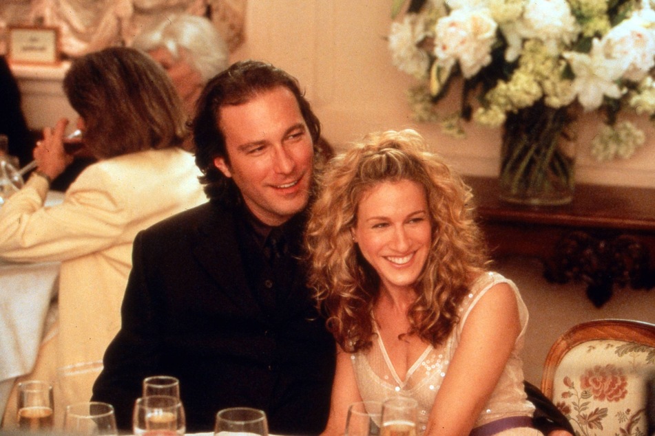 Fan favorite character Aidan Shaw (l) is set to return in the Sex and the City sequel, And Just Like That...