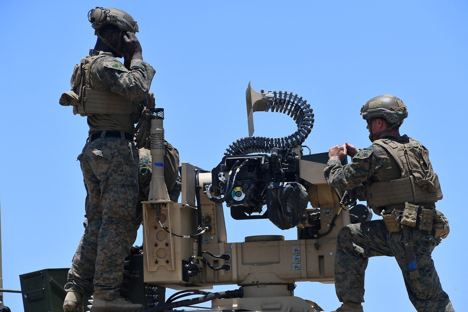 American Marines prepare the MADIS counter drone system during the annual US-Philippines joint military exercise Balikatan at a naval training base north of Manila.