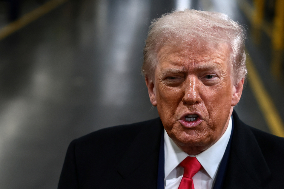 President Donald Trump visits a Ford production center in Dearborn, Michigan, on January 13, 2026.