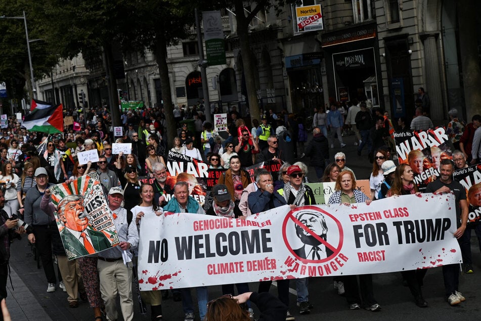 Thousands of protesters gathered in Dublin to demonstrate against Trump's visit. They carried signs and chanted, "Donald Trump's not welcome here."