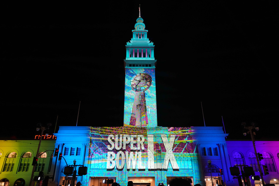 The Super Bowl LX logo is projected on the Ferry Building in San Francisco, California.