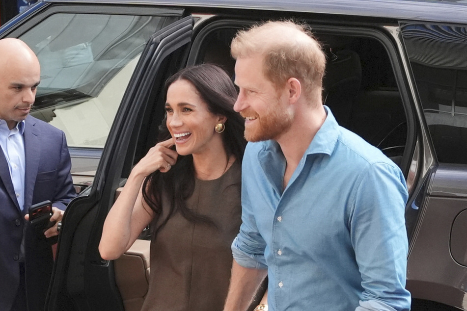 Prince Harry (r) and Meghan Markle are reportedly considering a return to the UK.