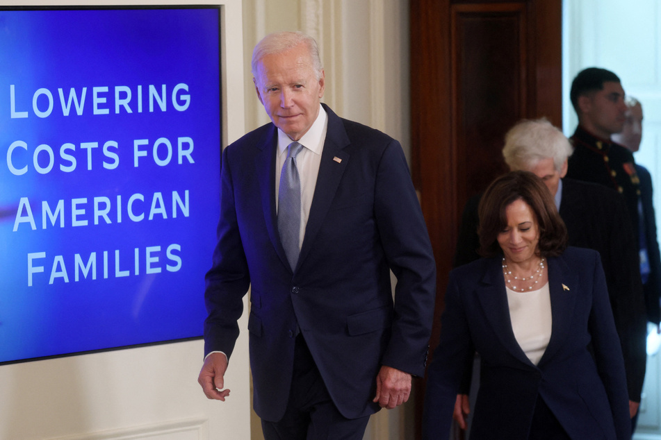 President Joe Biden and Vice President Kamala Harris hold an event about lowering healthcare costs in the East Room at the White House.