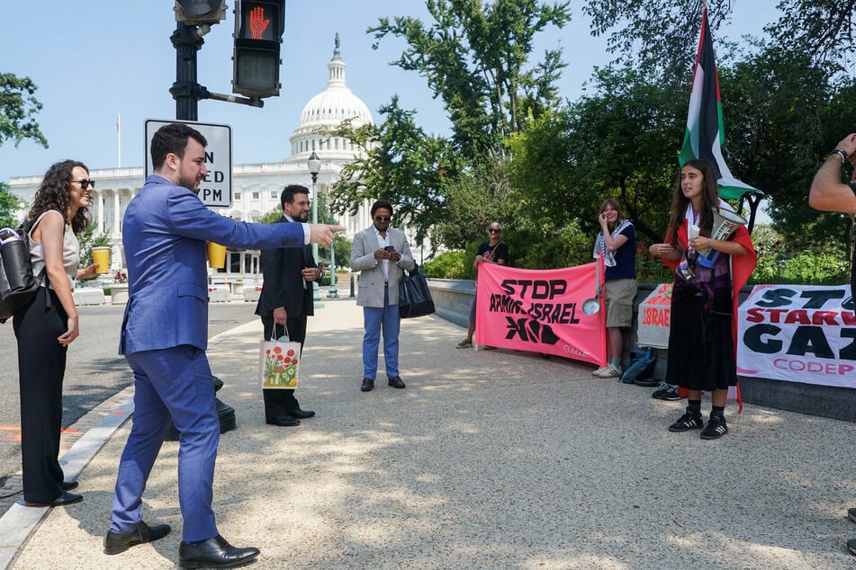 Mahmoud Khalil stops to speak with demonstrators protesting in support of Palestinians in Gaza during his visit to Capitol Hill on July 22, 2025.