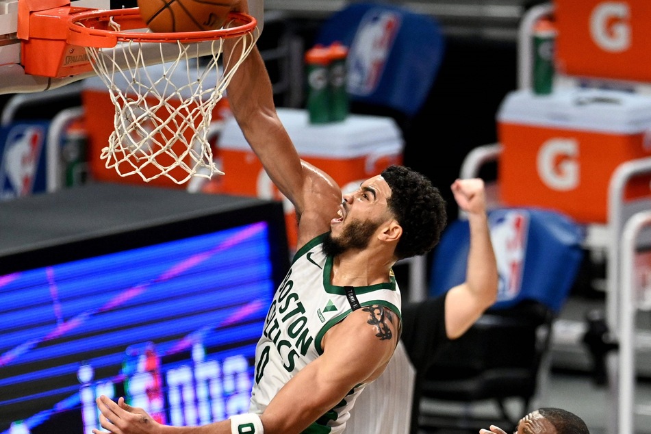 Jayson Tatum scored 31 in Boston's first win of the season.