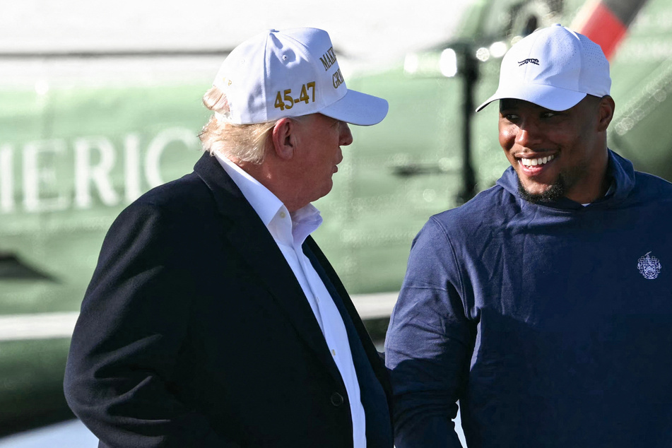 Philadelphia Eagles running back Saquon Barkley (r.) fired back at critics of his recent outing with President Donald Trump ahead of the team's White House visit.