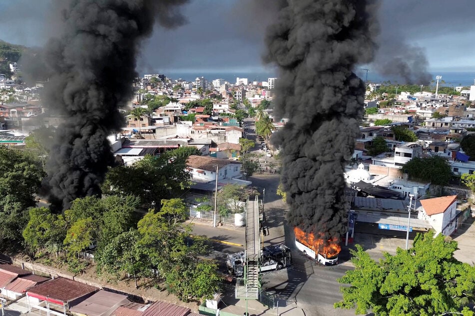 Cartel members set fire to vehicles and buildings in multiple Mexican states on Sunday, sparking widespread panic.