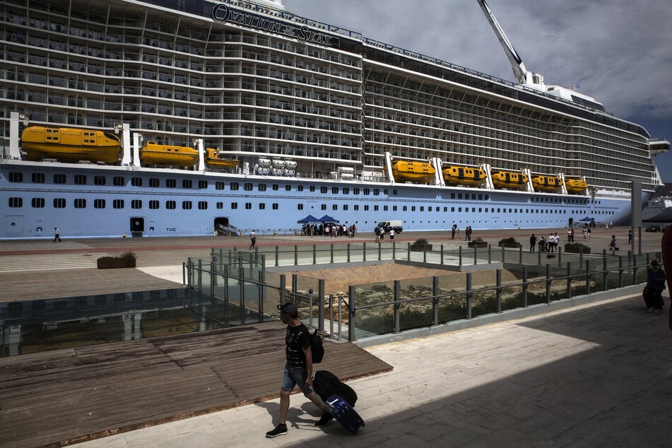 The Ovation of the Seas"is one of Royal Caribbean's largest cruise ships, accommodating nearly 5,000 passengers (file photo).