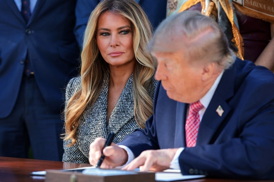 First Lady Melania Trump watches as President Donald Trump signs an executive order in the Rose Garden of the White House on October 19, 2026 in Washington, DC.
