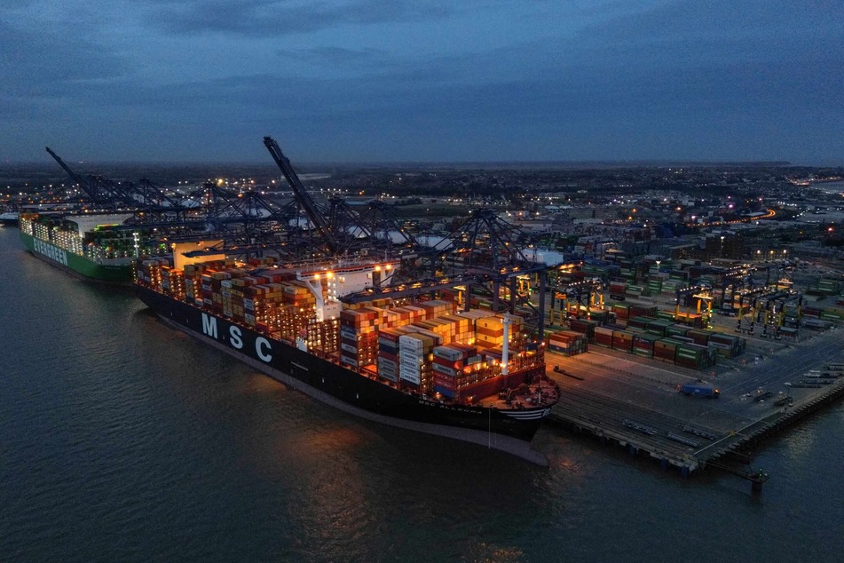 Containers ships at UK's largest freight port, as hundreds of cargo ships are being rerouted around the southern tip of Africa to avoid Houthi attacks in the Red Sea.