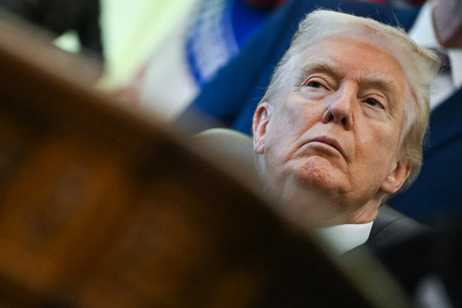 President Donald Trump has said he would be "open" to discussions on lifting heavy US sanctions on Iran.