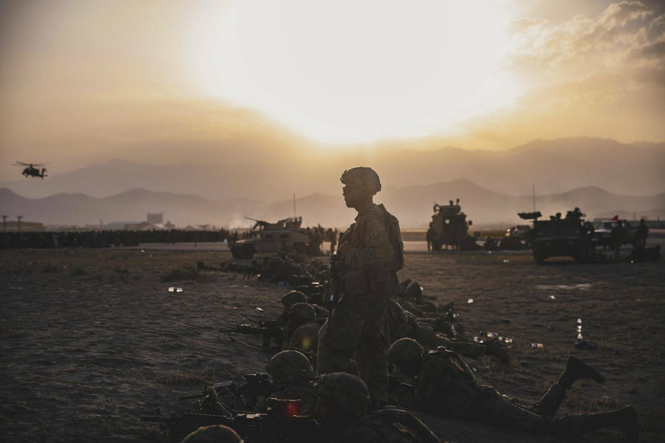 US Army Soldiers stand guard at Hamid Karzai International Airport in Kabul, Afghanistan.