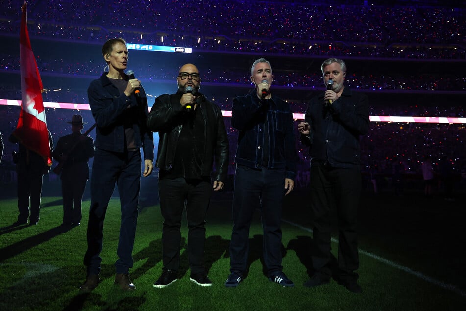 Barenaked Ladies sing the Canadian national anthem prior to the game between the Buffalo Bills and the Detroit Lions at Highmark Stadium.
