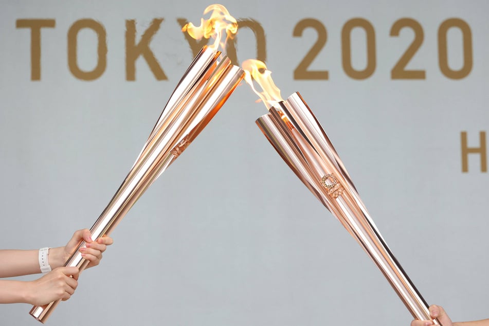 Muted reception as Olympic torch relay reaches Tokyo