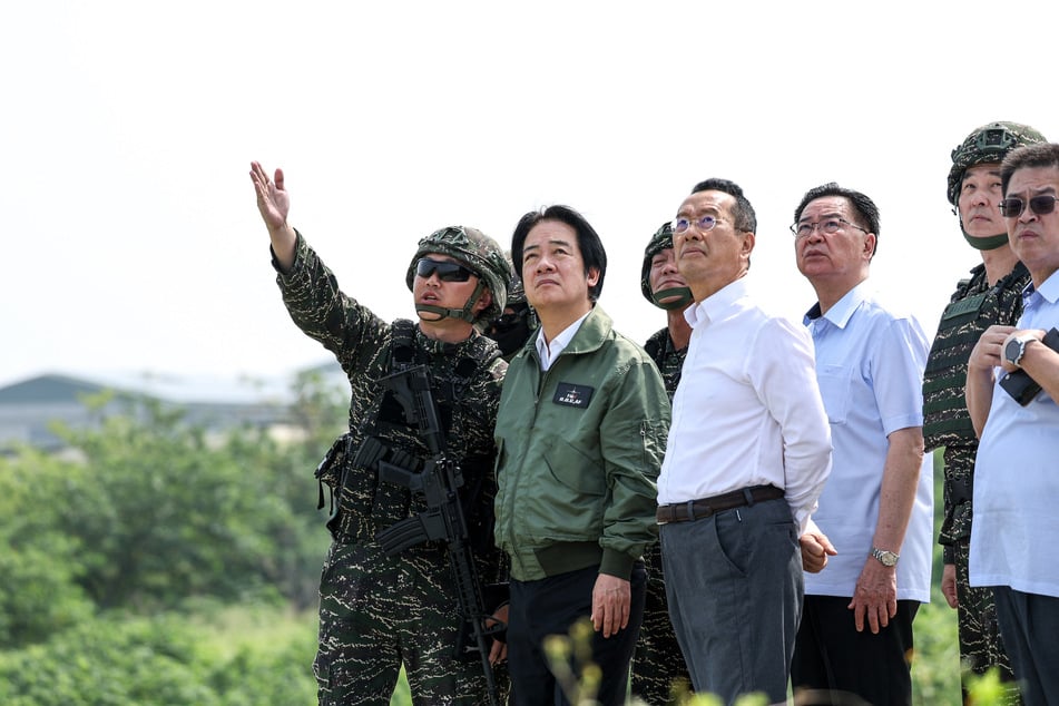 Taiwan President Lai Ching-te stands alongside Defense Minister Wellington Koo to inspect a drone operation at a navy base on August 8, 2026.