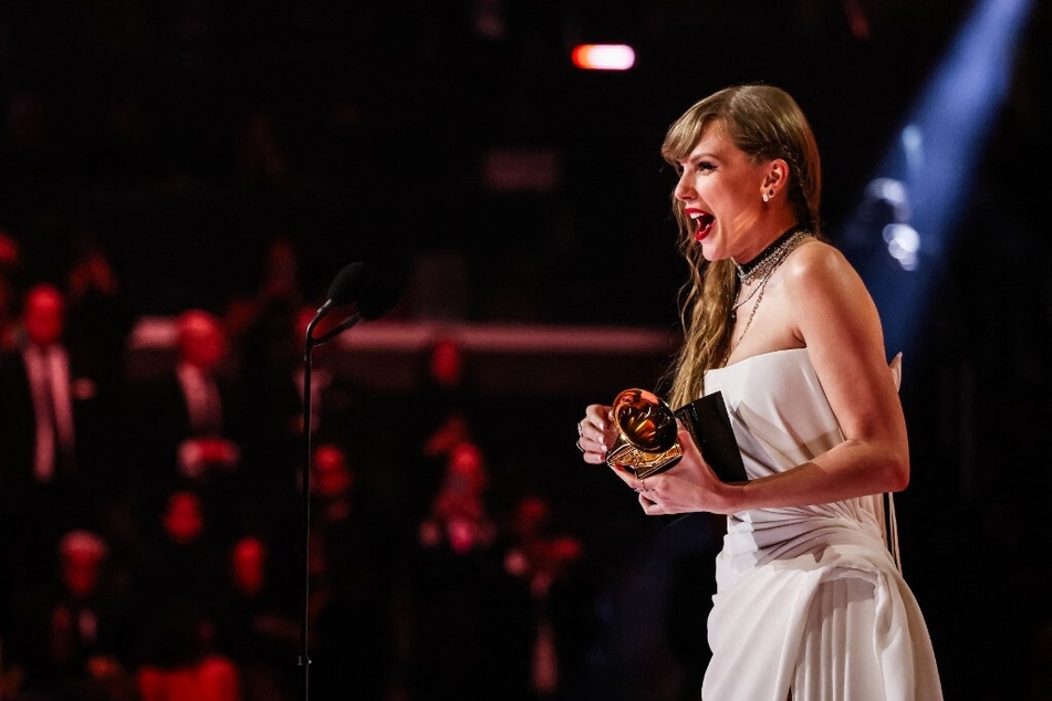 Grammys Live: Taylor Swift wins Album of the Year and makes huge announcement!