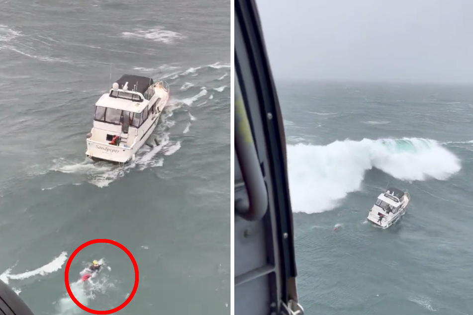 Quick as a flash, the rescuer swims to the maneuverless motor yacht.