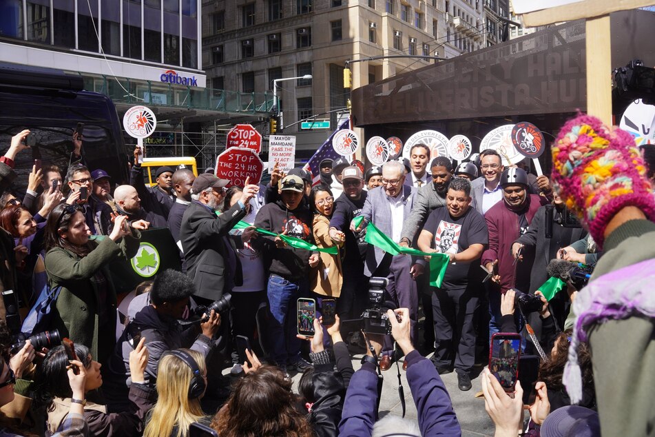 Senator Chuck Schumer celebrates the installation of the City Hall Park Deliverista Hub in New York on April 7, 2026.