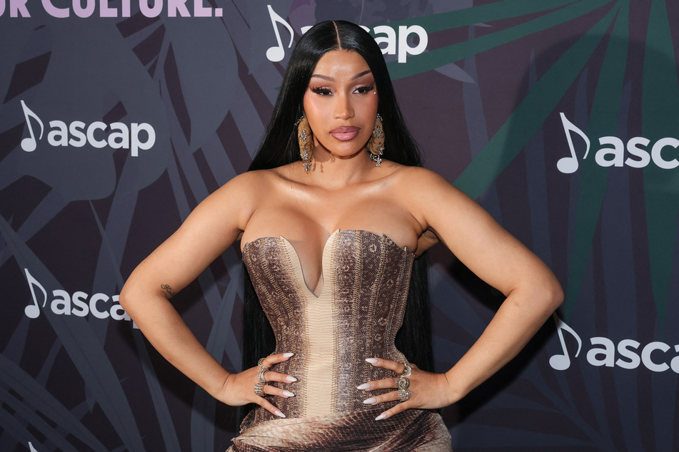 In a recent live chat with fans, rapper Cardi B spilled the tea on the challenges she faced putting out her upcoming record, Am I the Drama?.