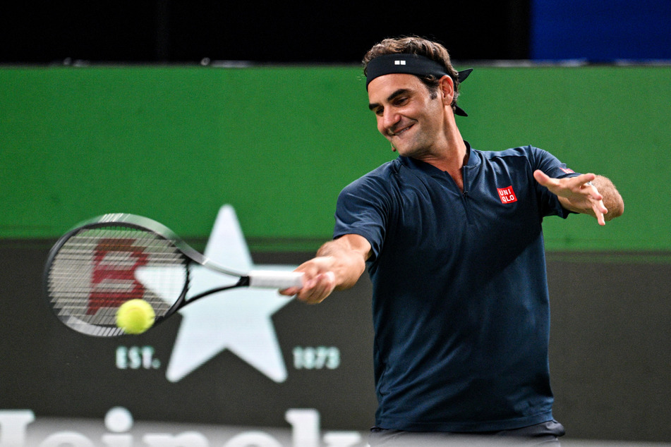 Roger Federer participates in a celebrity doubles match at the Shanghai Masters tennis tournament on October 10, 2025.