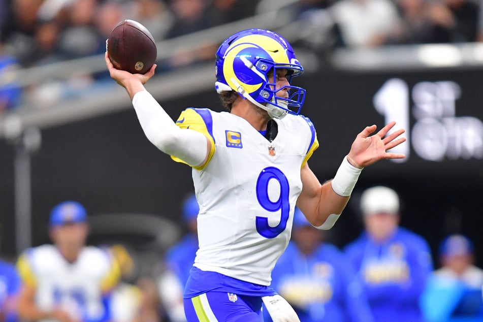 Los Angeles Rams quarterback Matthew Stafford drops back to pass against the Las Vegas Raiders in the first half at Allegiant Stadium.