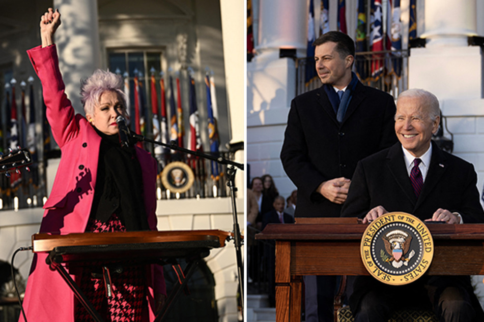 Secretary of Transportation Pete Buttigieg (c) joined President Joe Biden (r) on stage as he signed the Respect for Marriage Act into law.