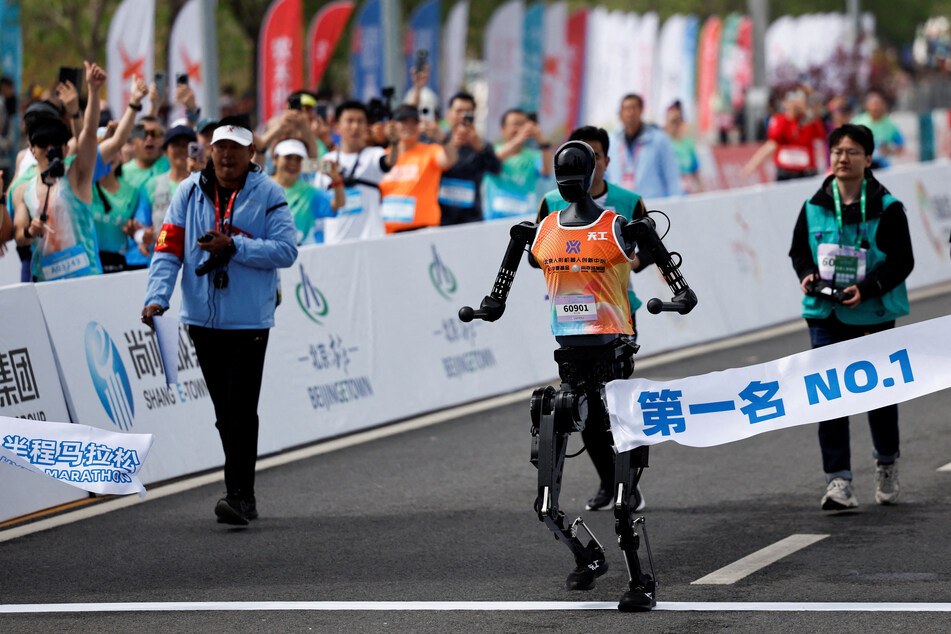 Beijing hosted the world's first half-marathon pitting humans against robots, showcasing China's rapidly developing tech sector.
