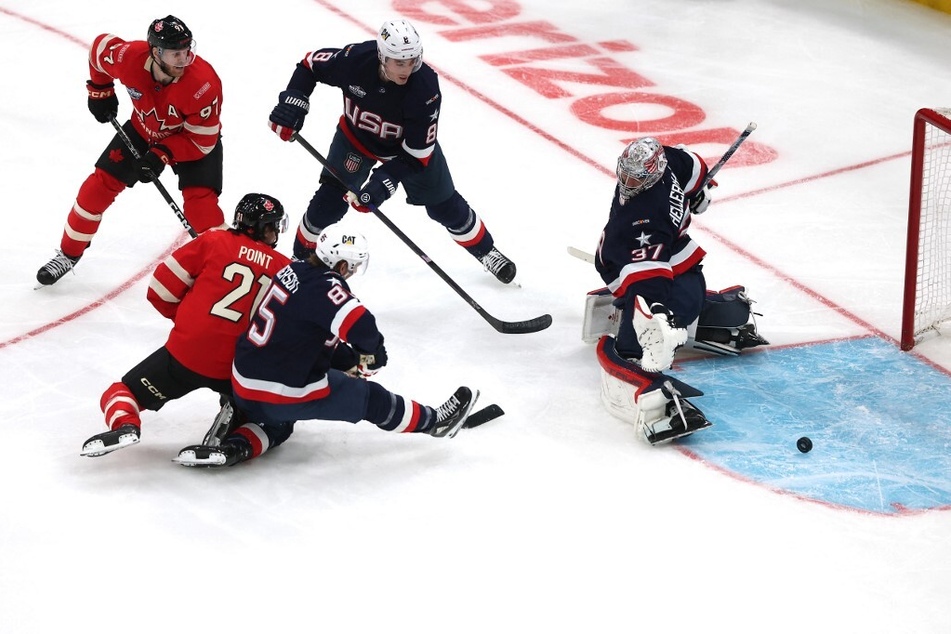 Connor Hellebuyck of Team USA tends net against Team Canada during the second period in the NHL Four Nations Face-Off Championship Game.