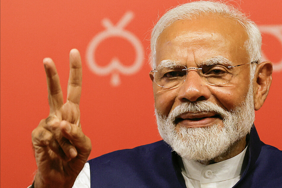India's Modi celebrates reelection as prime minister as opponents hail his "moral defeat"