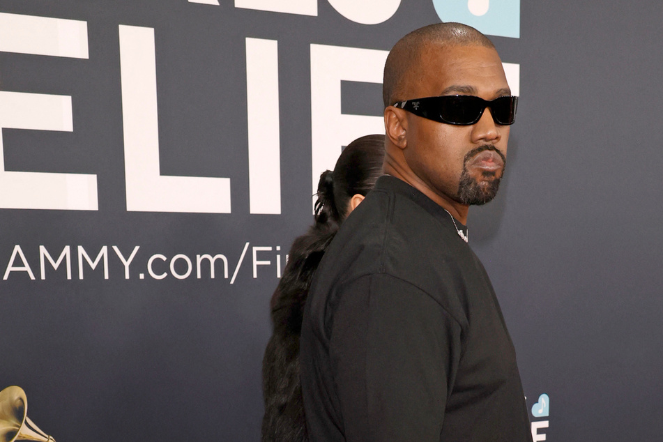 Kanye West has sparked outrage after debuting a Super Bowl ad to promote his Yeezy store, where only one item was for sale: a swastika t-shirt.