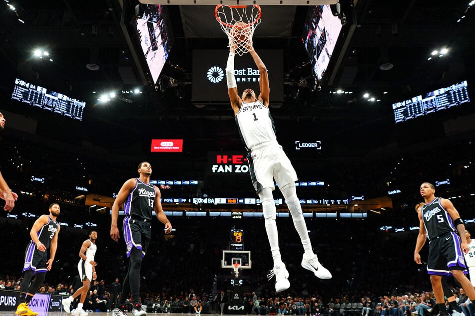San Antonio Spurs forward Victor Wembanyama goes up to dunk during the first half against the Sacramento Kings at Frost Bank Center on October 16, 2026.