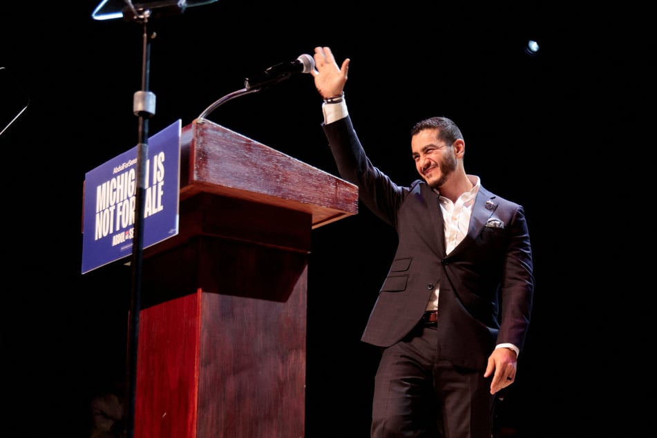 Democratic candidate for Senate Abdul El-Sayed waves on stage during a primary election night rally in Detroit, Michigan, on August 5, 2026.