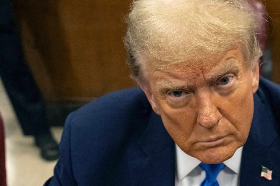 Former US President Donald Trump appears in court for opening statements in his trial for allegedly covering up hush money payments at Manhattan Criminal Court on Monday in New York City.