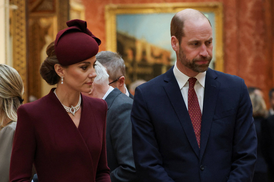 Prince William (r.) and Kate Middleton are said to be preparing for their future roles "sooner than they would have expected."