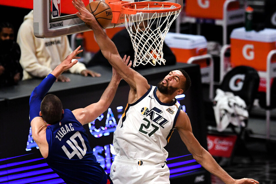 Jazz center Rudy Gobert is the 2021 NBA Defensive Player of the Year, his third award in four years.