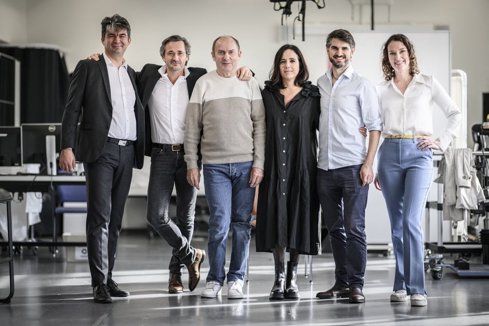 (From L) Tomislav Milekovic, Gregoire Courtine, Marc, Jocelyne Bloch, Eduardo Martin Moraud, and Camille Varescon pose during their presentation of a new neuroprosthesis that restores fluidity of movement to a patient suffering from Parkinson's disease in Lausanne on November 3, 2023.