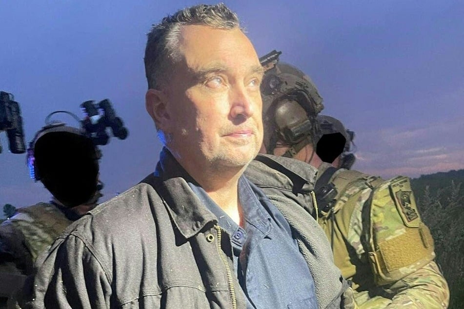 This unlocated handout photo released by the Ramsey County Sheriff's Office on June 15, 2025, shows Vance Boelter, the suspected killer of a Democratic Minnesota state lawmaker, as he was being apprehended.