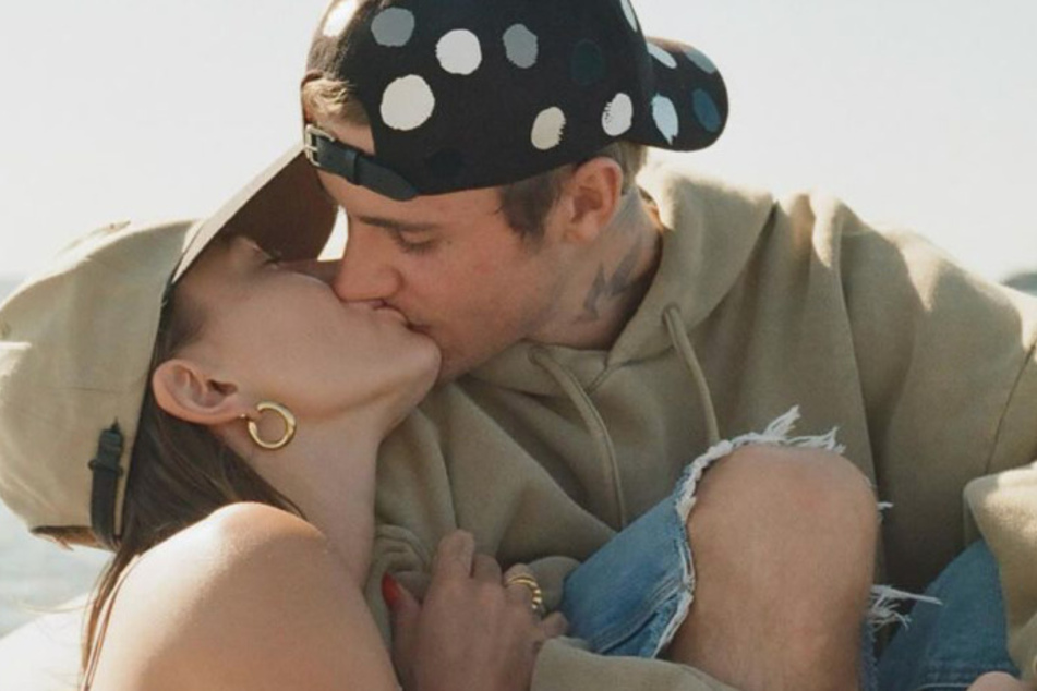 Hailey and Justin Bieber (r.) have been hit with split rumors after the model's father reshared a post that requested prayers for the couple.
