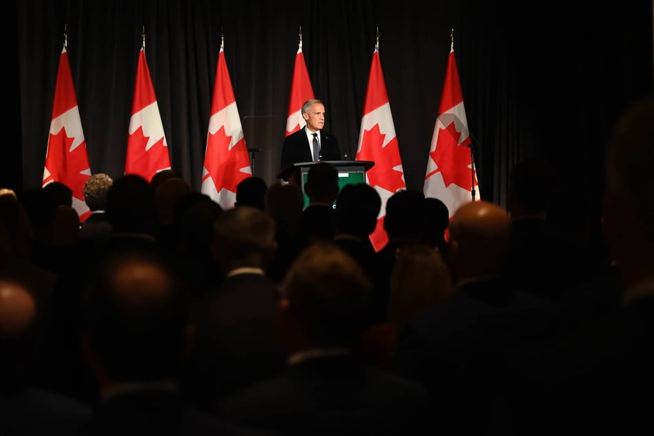 Canadian Prime Minister Mark Carney delivers remarks in Toronto, mere days before President Donald Trump's latest round of tariffs came into effect on Tuesday.